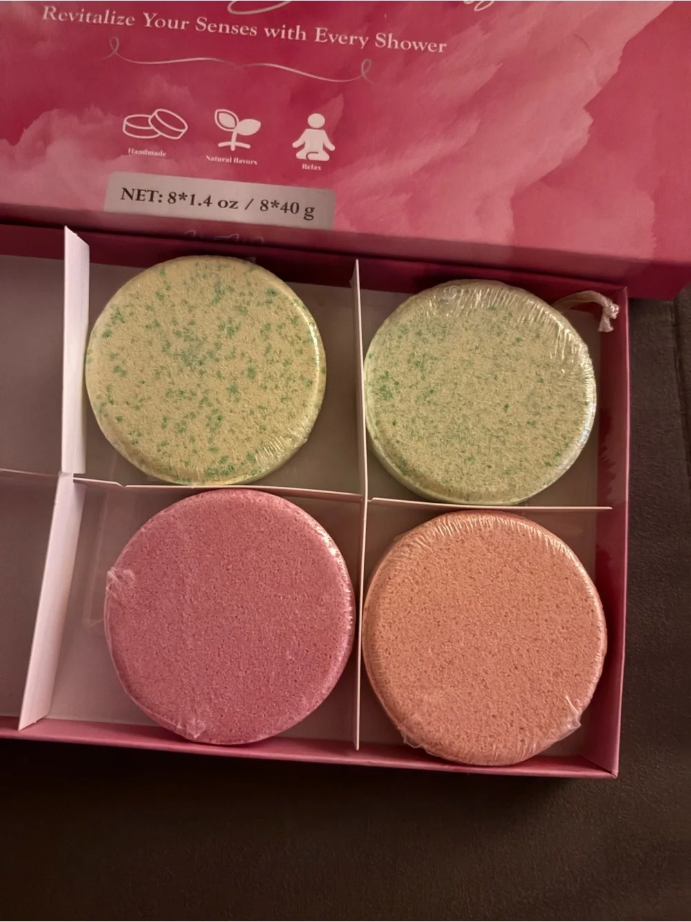 Shower steamers, 4 left, 2 tea tree, one orange, and one rose
